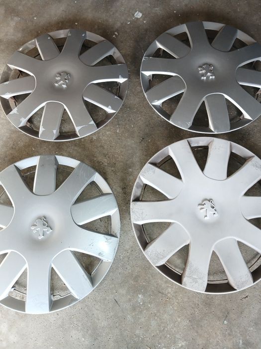 Tampões Peugeot originais roda 14 usados..
