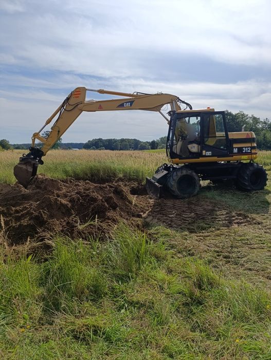Usługi koparko-ładowarką/koparką kołową