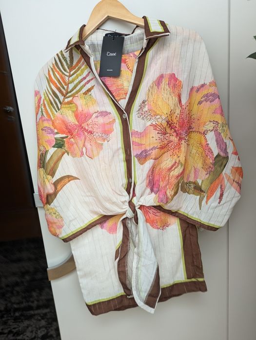 Fato CAWÉ com etiqueta