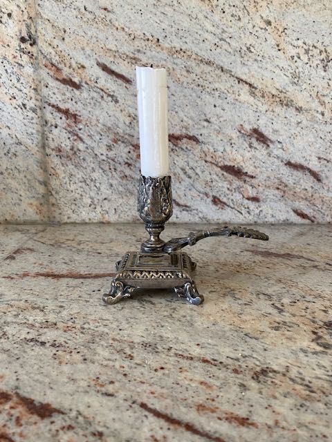 Castiçal em metal pesado