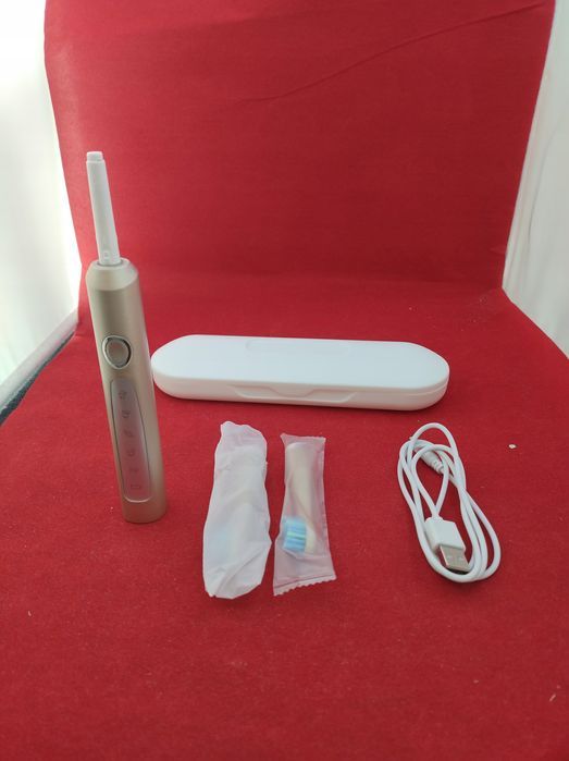 uszkodzona coulax sonic elektryczna szczoteczka do zębów z etui beżowa