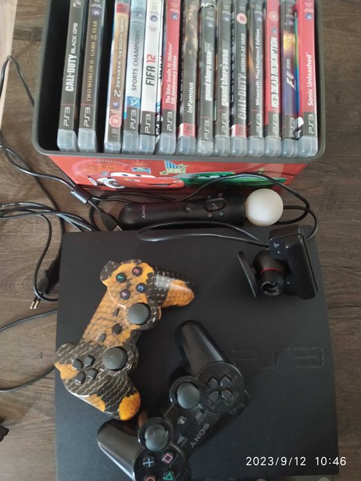 Ps3, dwa pady, kontroler move, kamera. 14 gier
