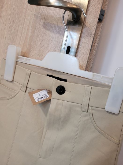 Zara woskowane spodnie beżowe