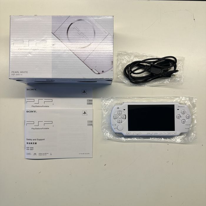 Psp-2004 + charger cable + box