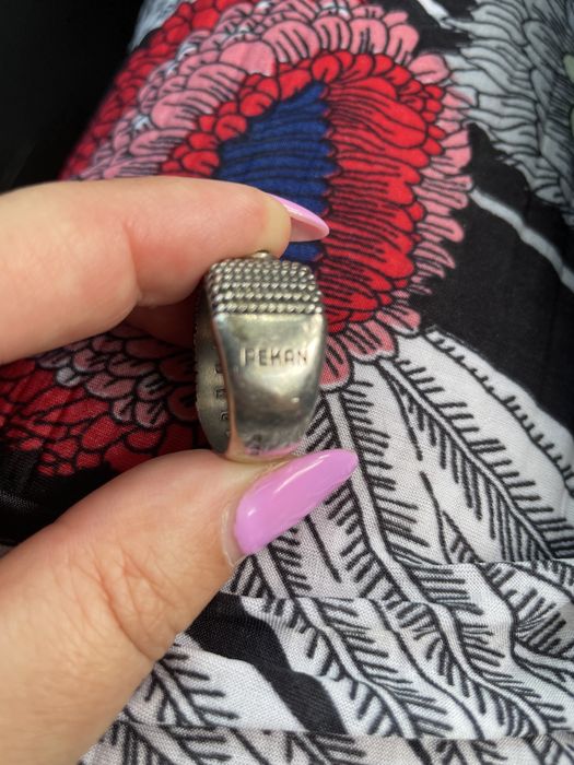 Anel Pekan prata e ouro