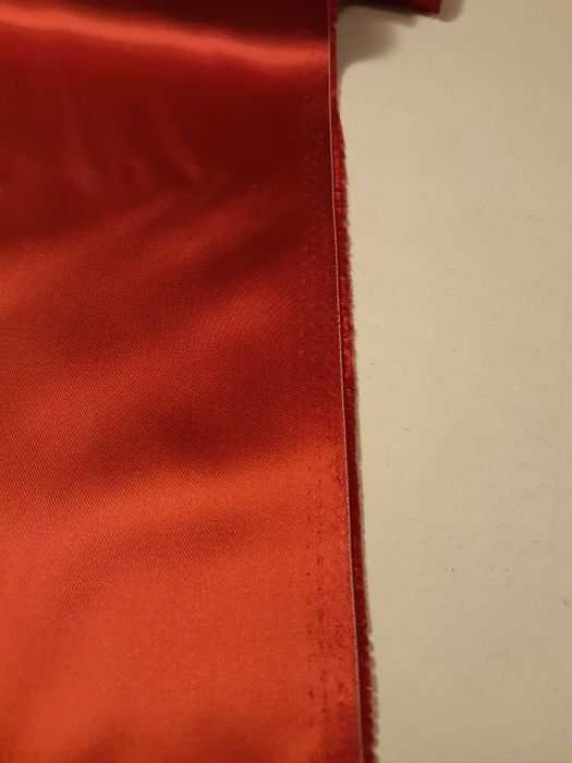 Podszewka ciemny pomarańcz szer.144 cm.