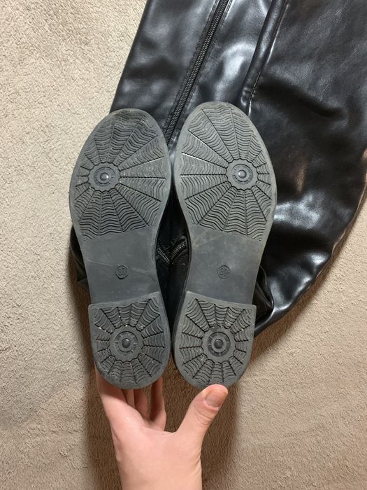 Високі сапоги