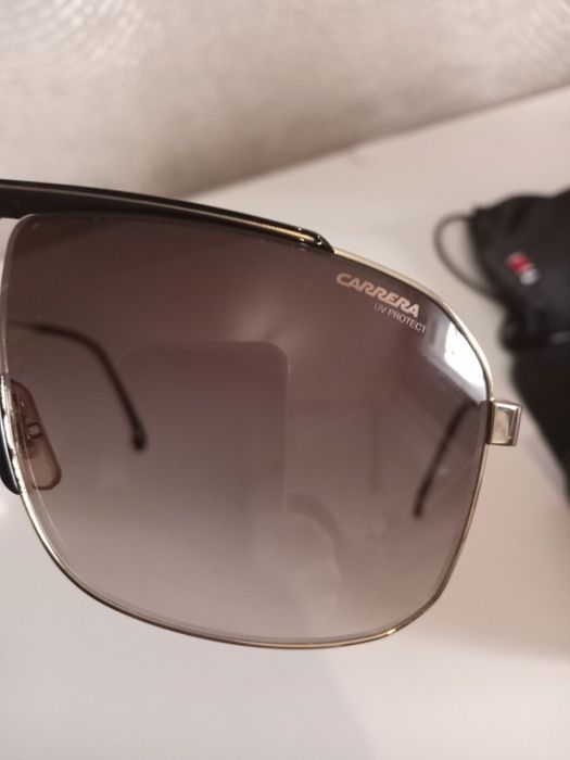 Продаю фирменные солнцезащитные очки Каррера !