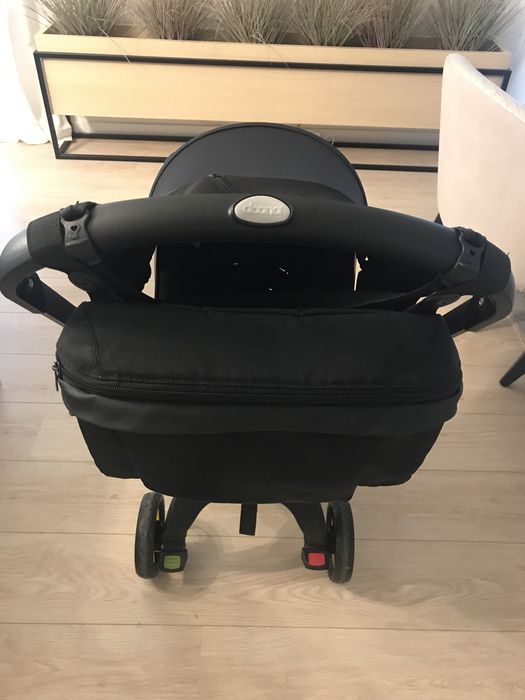 Carrinho Doona + protetor Sol