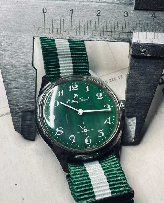 Mathey Tissot mecânico de corda manual