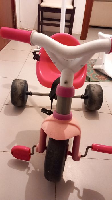 Triciclo rosa menina