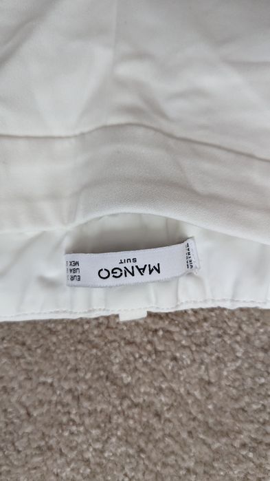 Spodnie garniturowe białe Mango