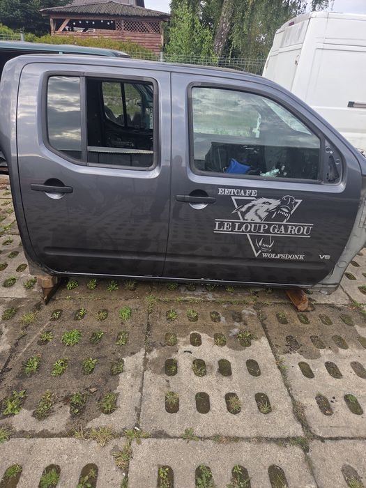 Drzwi przód tył prawe lewe nissan navara D40 KAP K669