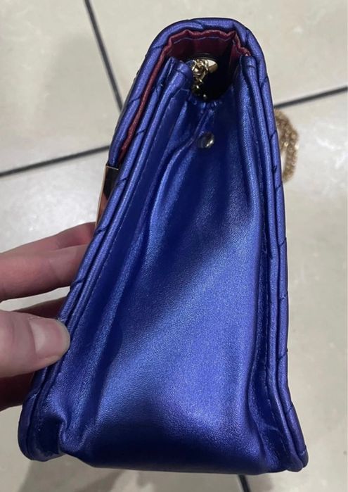 Mala azul metalizada ysl