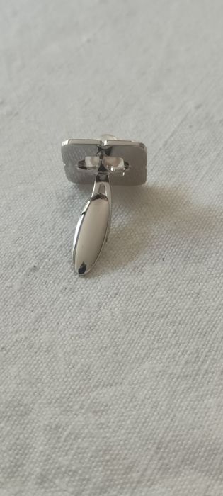 Negócio de oportunidade. Botões de punho Mikimoto