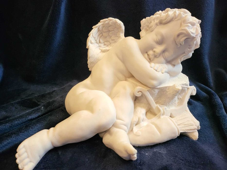 Cupido a Descansar em Marfinite