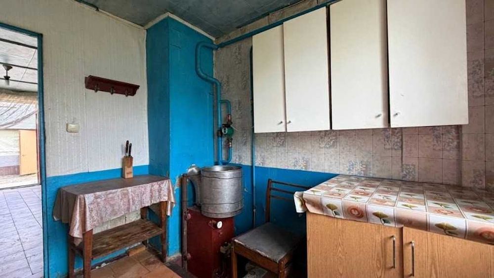 Продаж цегляного будинку 78м². 4 кімнати. 33 сотки. Центр. ID:813