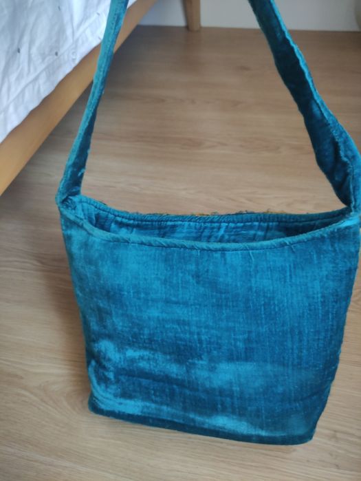 Mala em tecido azul com mandála