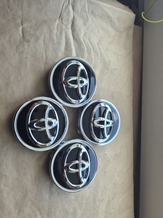 Dekielki Zaślepki kapsle do alu felg do Toyota czarne 61/61mm promocja