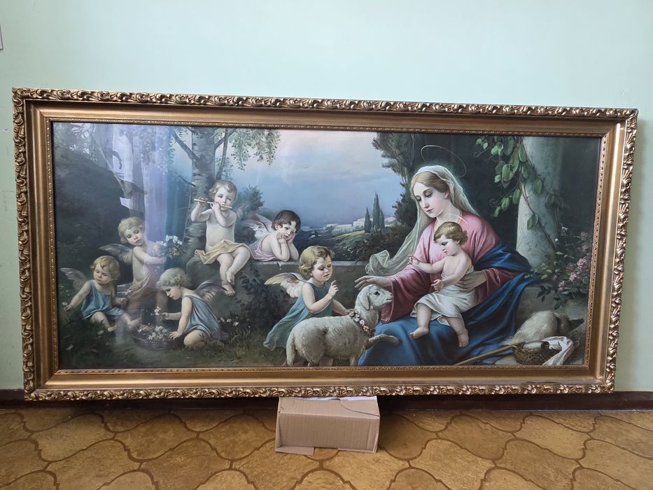 Oryginalna drewniana pozłacana polichromicznie rama z obrazem świętym za szkłem.