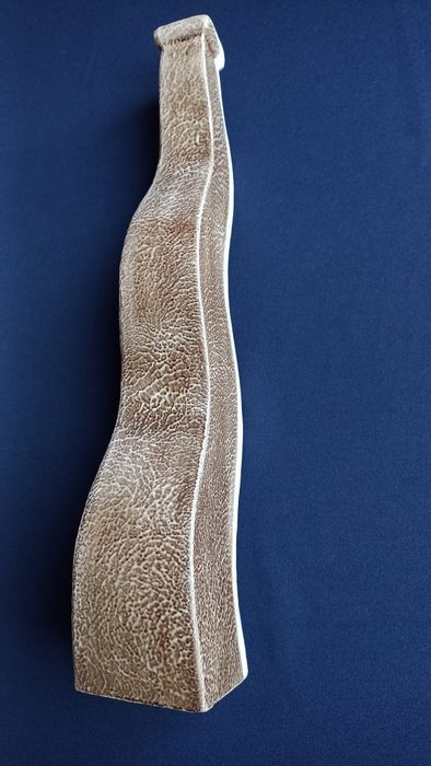 Wavy ceramic jug.64862790625026126