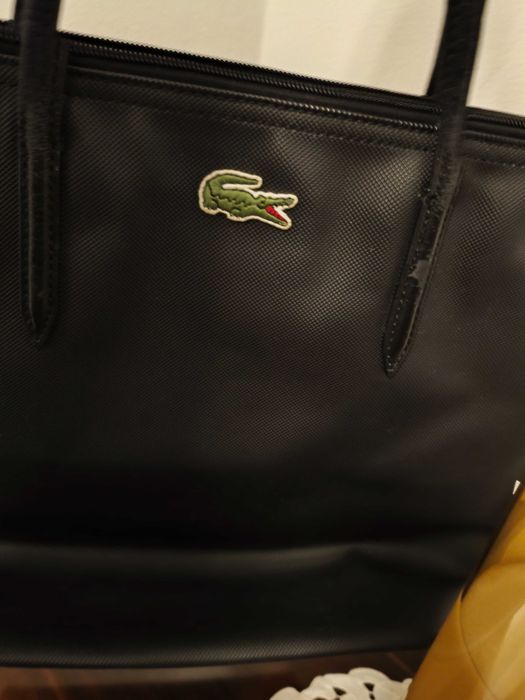 Saco Lacoste (original). Azul escuro.