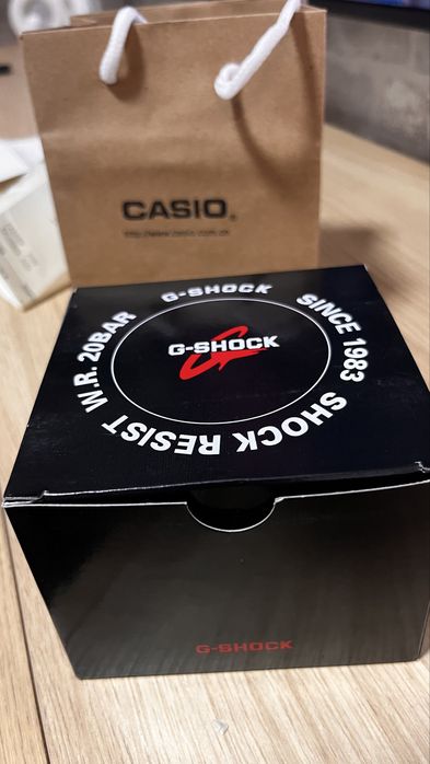 G shock preto e dourado