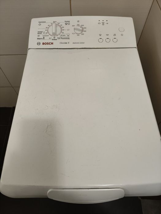 Пральна машина з вертикальною загрузкоюBOSCH WOR 16152 OE