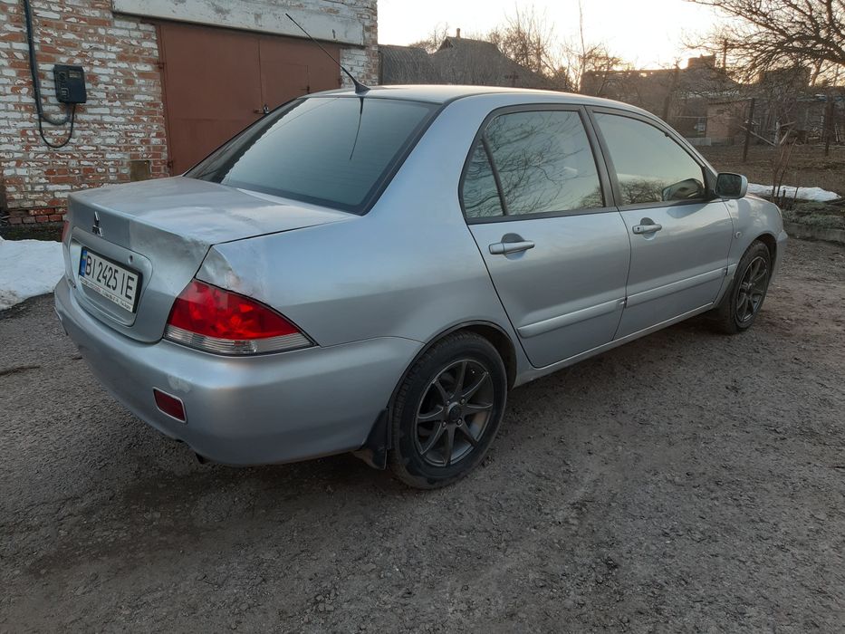 Мітцубісі Ланцер  9 з газом 4.