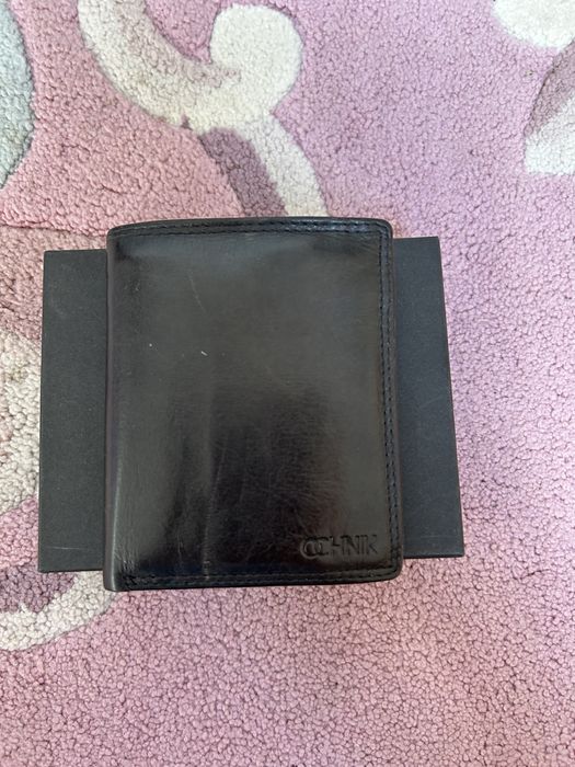 Skórzany portfel firmy OCHNIK jak nowy!