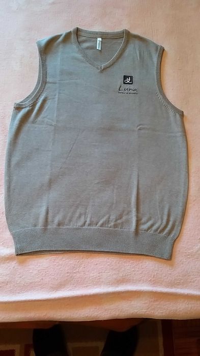 Colete de malha sem mangas com decote em V