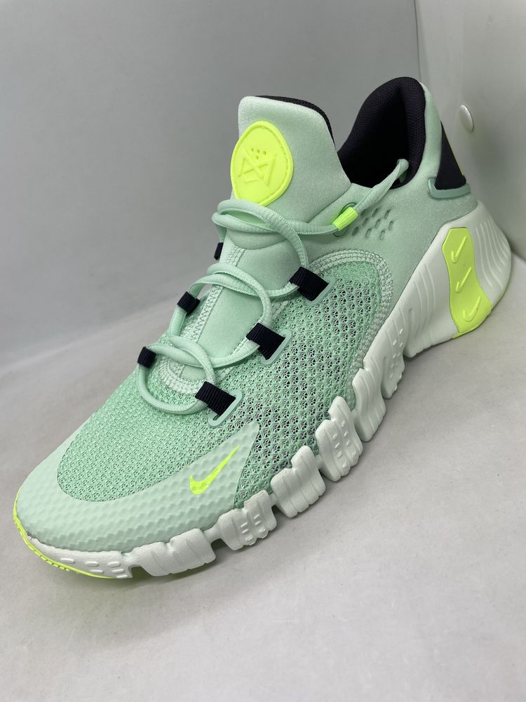 Green nike foams hot sale