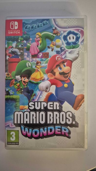 Nintendo Switch V2 + 8 gier