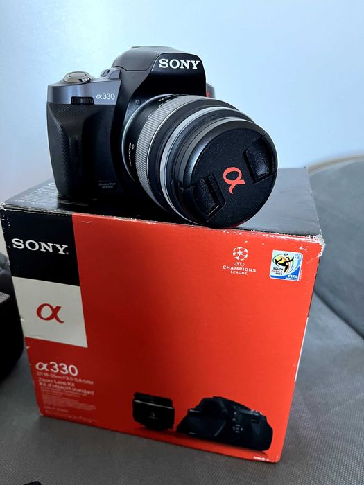 Câmara Sony Alpha DSLR-A330, Filtro UV, Cartão de Memória 1Gb, Bolsa
