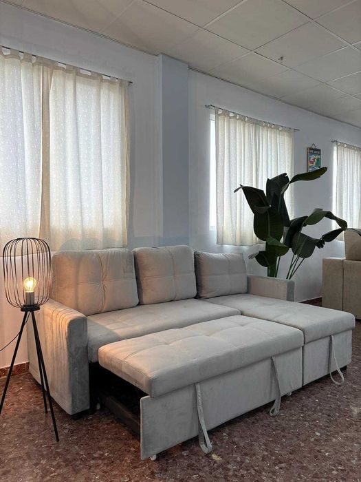 Novo sofá-cama cinzento claro em veludo