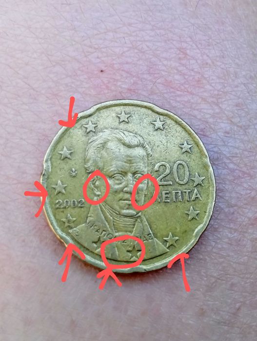Moedas de 20 cêntimos gregas 2002, com defeitos e letra "E"