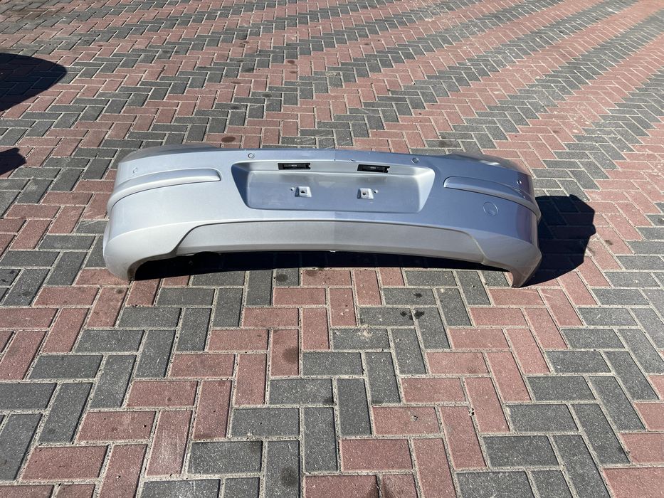Задній бампер Опель Астра Н