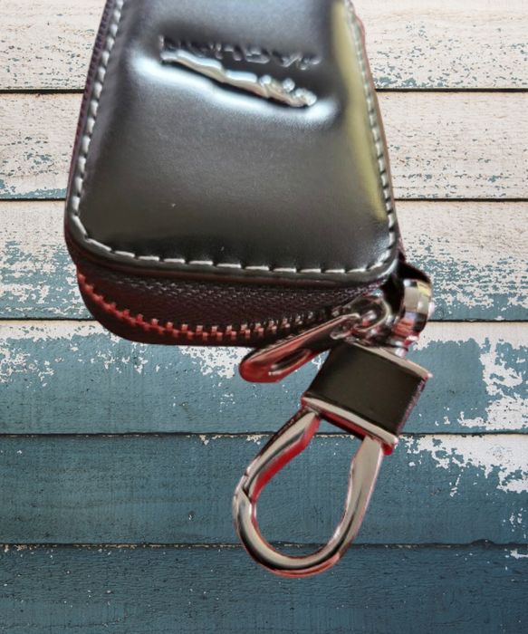 Jaguar- carteira, porta chaves. Novo. Excelente oportunidade