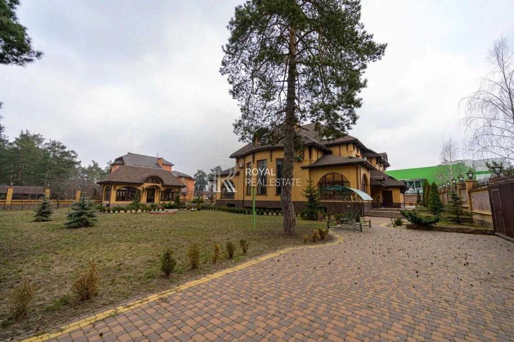 Оренда Будинок Київ Лісовий масив вул. Кіото 940 м² 11 кімнат Ліс Басейн Сауна Сонячна станція Тепловий насос Камін Автономність Метро 1 км