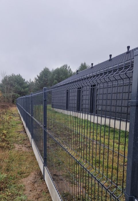 Montaż ogrodzeń panelowych,  palisadowych,  ze sztachet,  bramy,