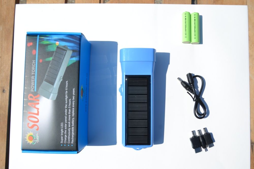 Фонарь. Фонарик на солнечной батареи+зарядное