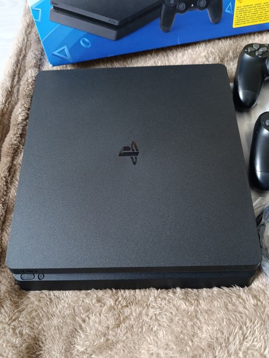 Bundle PS4 Slim + 2 comandos + 9 jogos + caixa e cabos originais