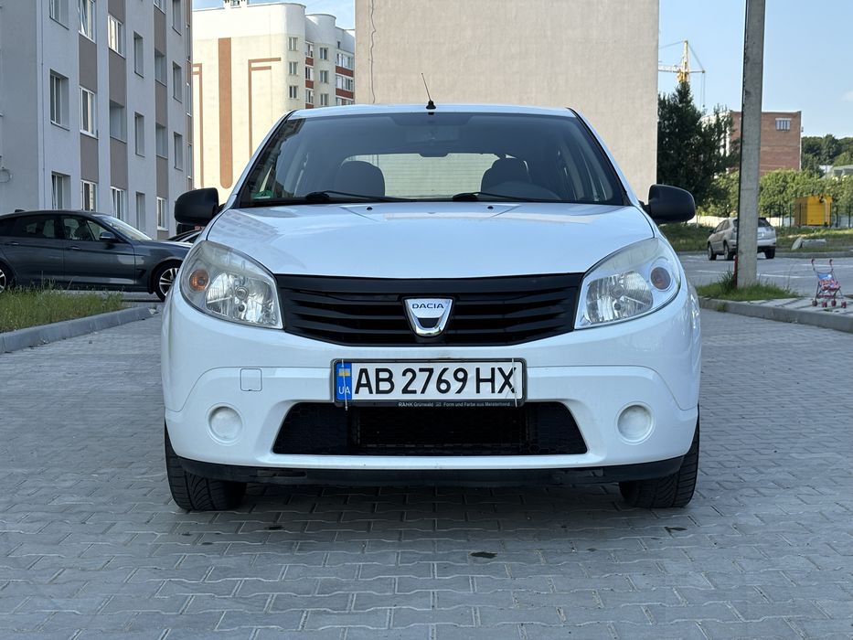 Сандеро 1.4 газ бензин