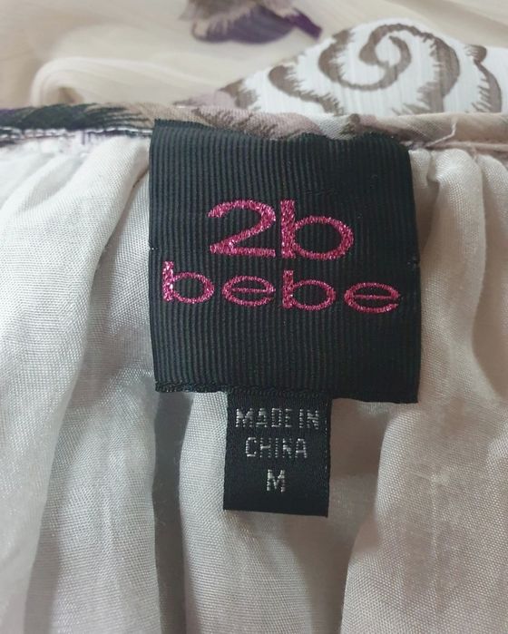 Zwiewna sukienka Bebe z USA falbany r 38