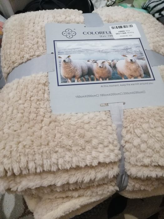 Теплі пледи на штучний овчині