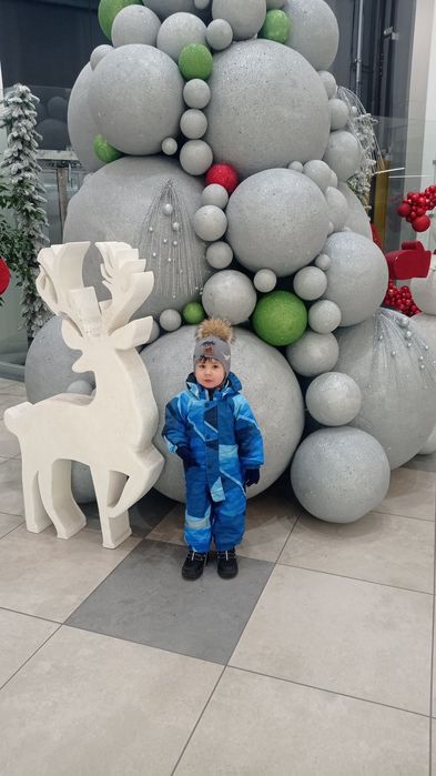 Зимовий комбінезон Reima, зимова шапочка з натуральним пампоном