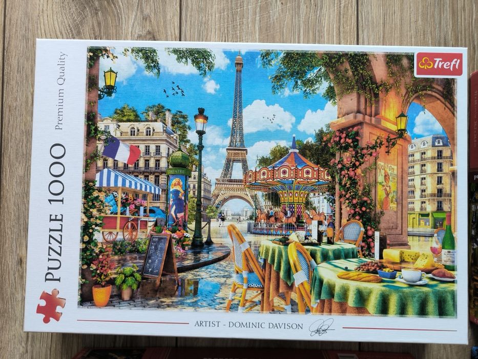 5 pudełek puzzli plus cztery antyramy do nich