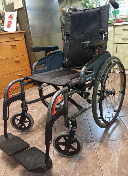 Инвалидная коляска