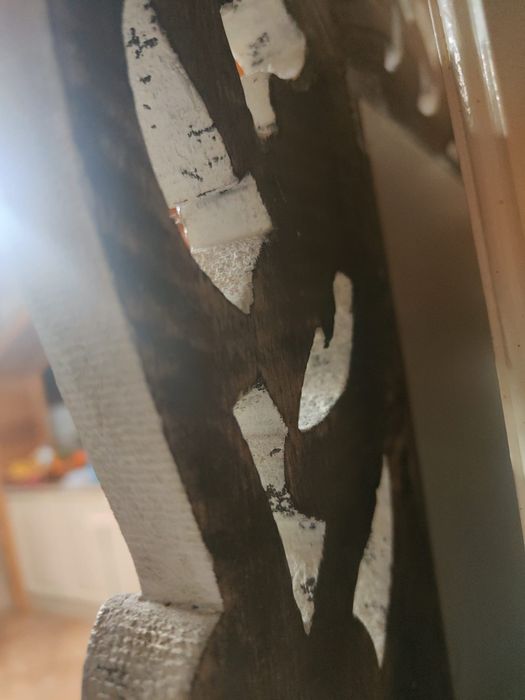 Espelho em madeira esculpida