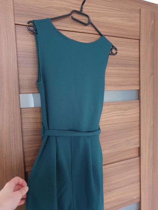 Elegancki kombinezon z kopertowym dekoltem r.36/S butelkowa zieleń